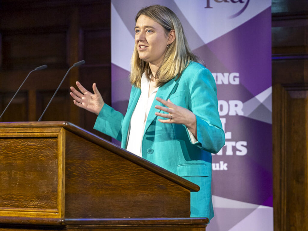 Then Cabinet Office Minister Georgia Gould addresses FDA delegates.